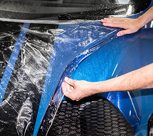 A gloss film is applied to a blue vehicle