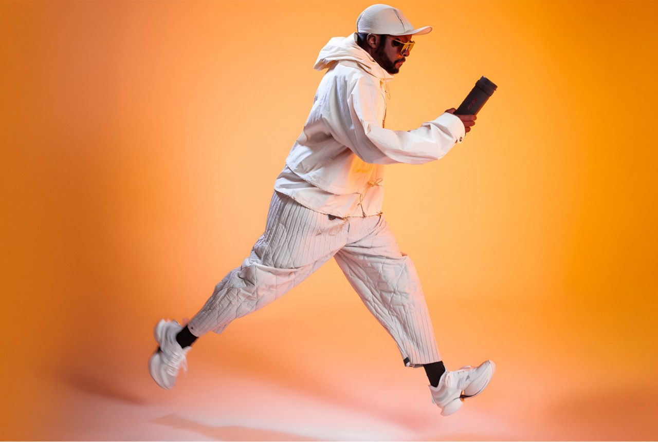 Will.i.am runs with the xboom Grab speaker in his hand. Will.i.am runs with the xboom Grab speaker in his hand.